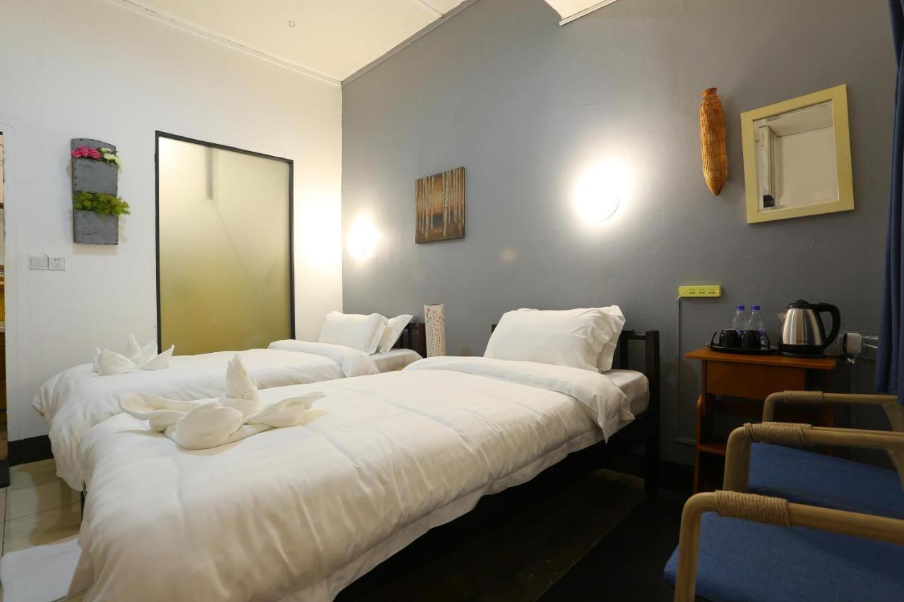 1M hotel Vientiane Kamer foto